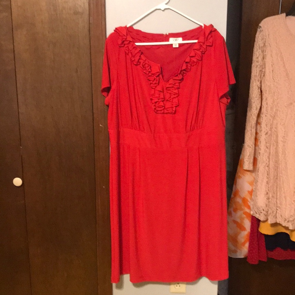 Sassy red knit dress with ruffle detail.